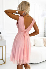 Numoco elegant cocktail dress with a wrap neckline and bow  Adomoo