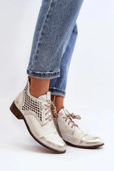 Step in style Women's natural suede boots with a low, openwork.  Adomoo