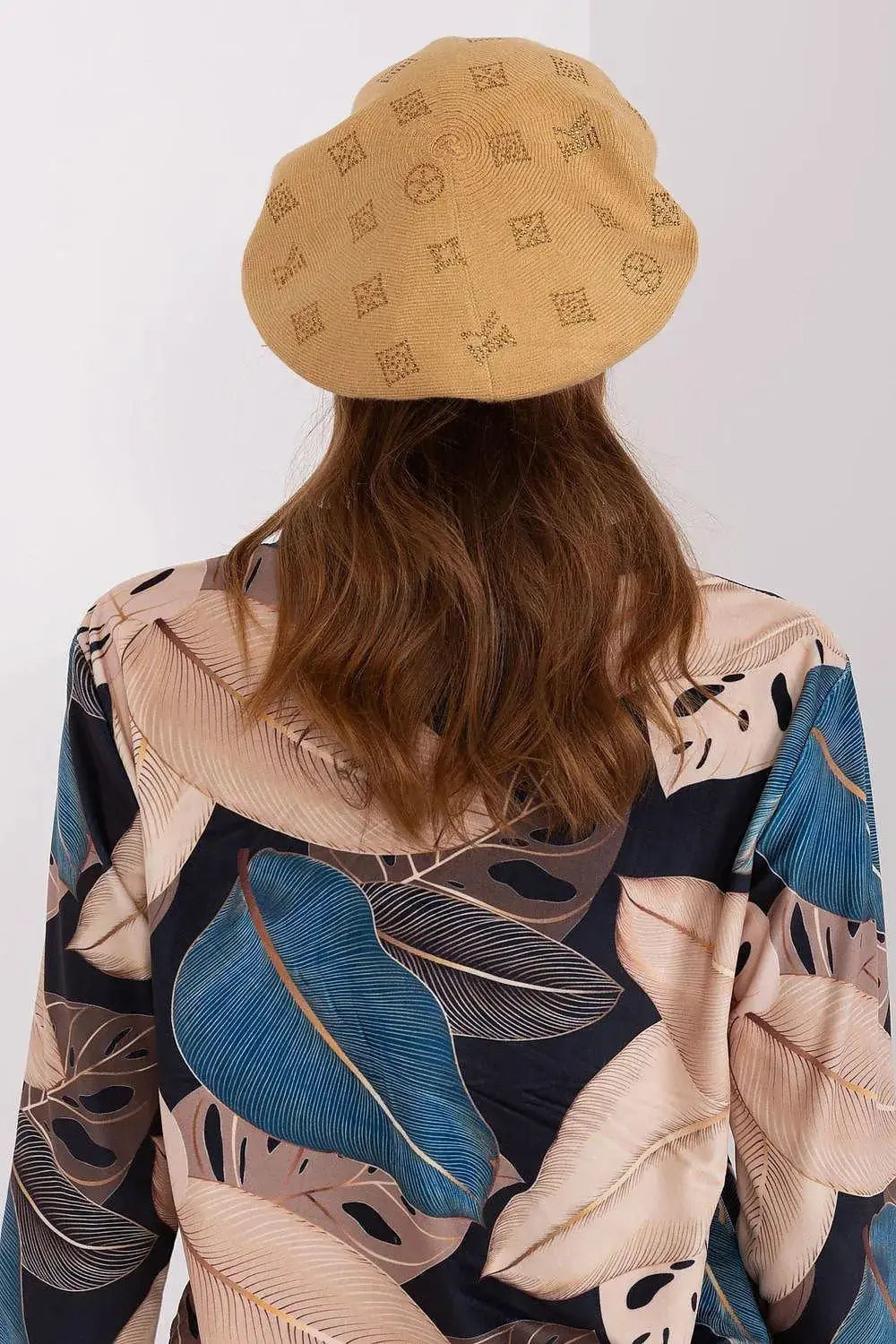 AT Knitted beret with interesting rhinestone application.  Adomoo