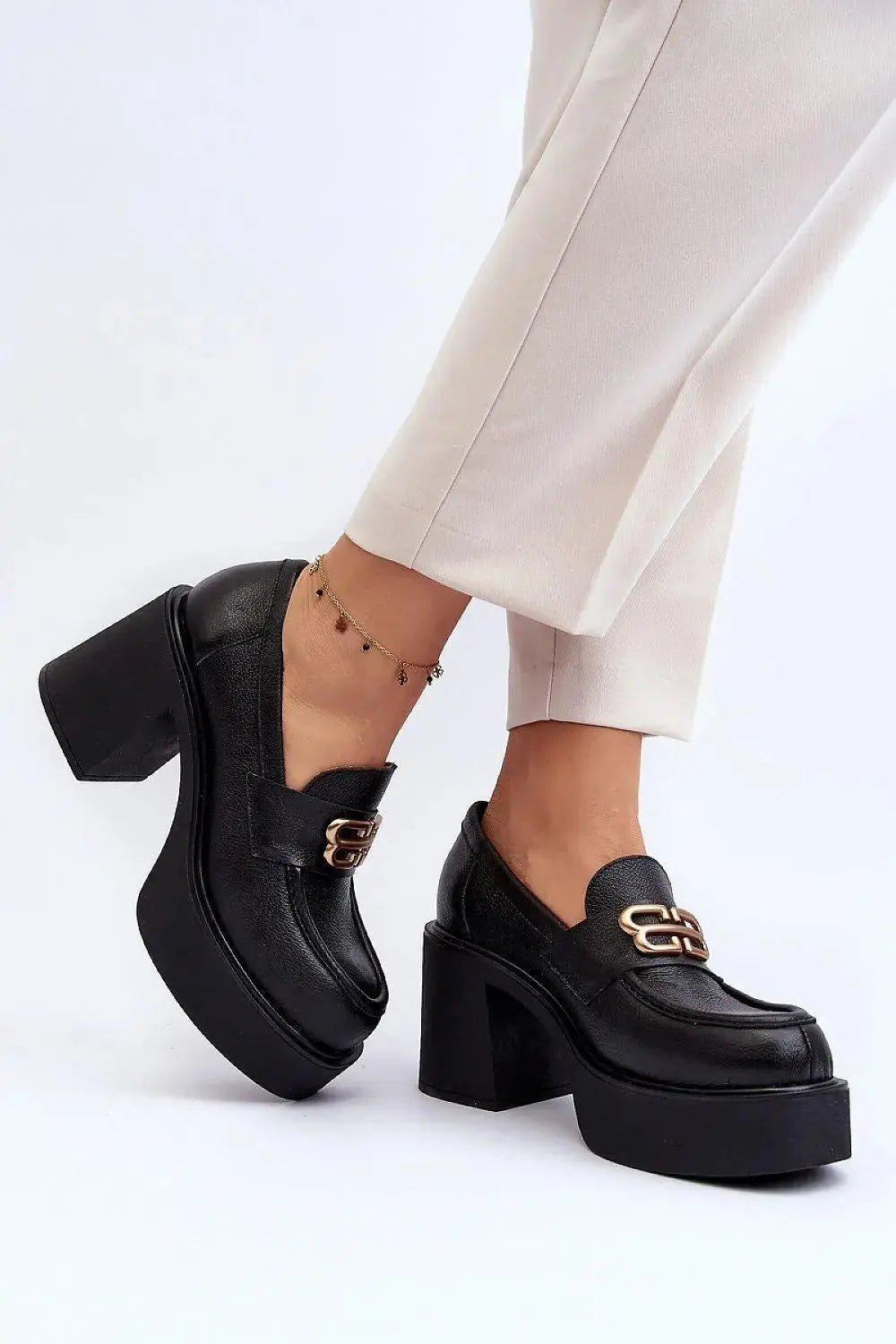 Step in style Women's heeled semi-boots with an upper made of eco-suede  Adomoo