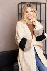 PeeKaBoo looser cut, unbuttoned cardigan  Adomoo