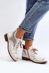 Step in style Women's natural suede boots with a low, openwork.  Adomoo