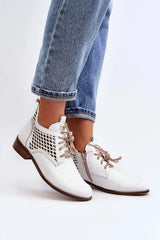 Step in style Women's natural suede boots with a low, openwork.  Adomoo